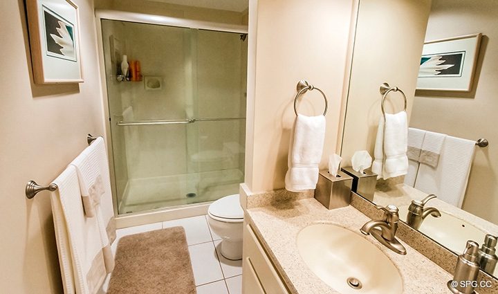 Guest Bathroom in Residence 1-101 at Oasis, Luxury Oceanfront Condos in Palm Beach, Florida 33480.
