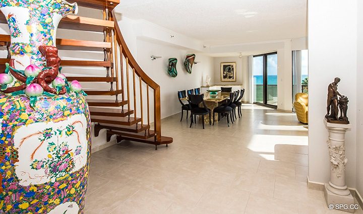 Stairway and Dining Room in Residence 3-501 For Sale at Oasis, Luxury Oceanfront Condos in Palm Beach, Florida 33480.