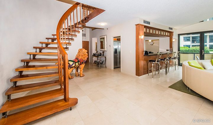 Curved Stairway in Residence 1-101 at Oasis, Luxury Oceanfront Condos in Palm Beach, Florida 33480.