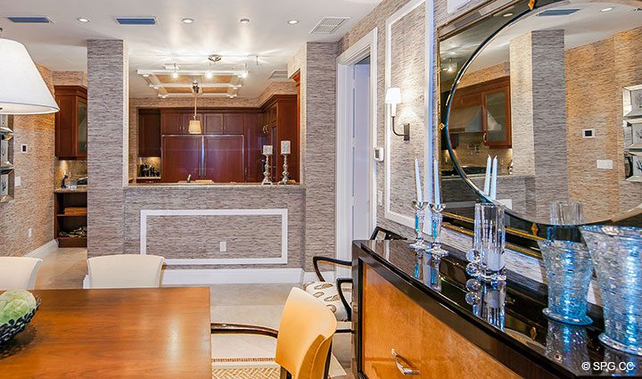 Dining Room and Kitchen in Residence 406 at Bellaria, Luxury Oceanfront Condominiums in Palm Beach, Florida 33480.