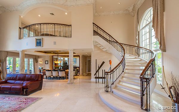 Elegant Curved Staircase from Living Room to Second Floor in Luxury Waterfront Estate Home,146 Nurmi Drive, Fort Lauderdale, Florida 33301