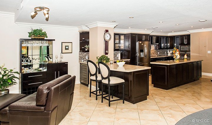 Open Living Room and Kitchen Layout in Residence 105 at La Cascade, Luxury Waterfront Condominiums in Fort Lauderdale, Florida 33304.