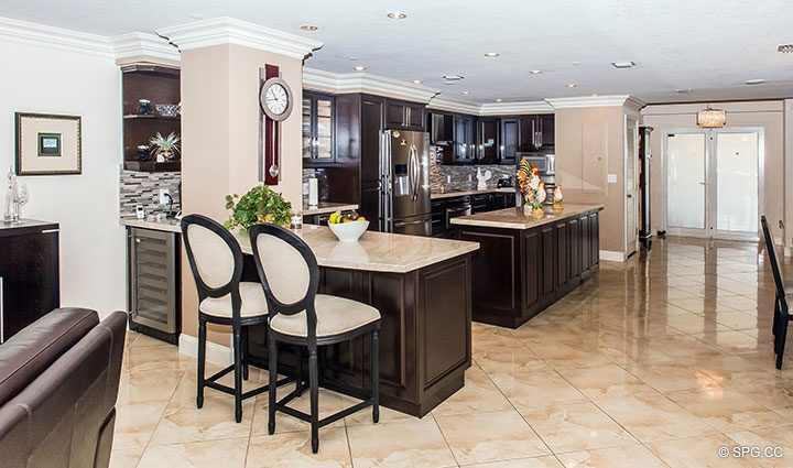 kitchen-and-bar-area-in-residence-105-at-la-cascade--luxury-waterfront-condominiums-in-fort-lauderdale--florida-33304.