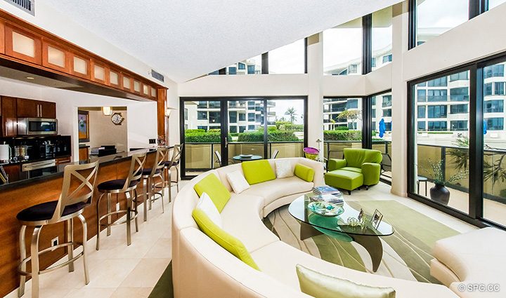 Living Room and Kitchen in Residence 1-101 at Oasis, Luxury Oceanfront Condos in Palm Beach, Florida 33480.