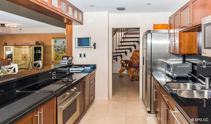 Kitchen inside Residence 1-101 at Oasis, Luxury Oceanfront Condos in Palm Beach, Florida 33480.