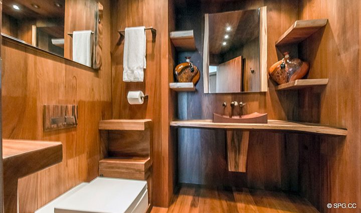 Exotic Wood Powder Room inside Residence 3806 at Portofino Tower, Luxury Waterfront Condominiums in Miami Beach, Florida 33139