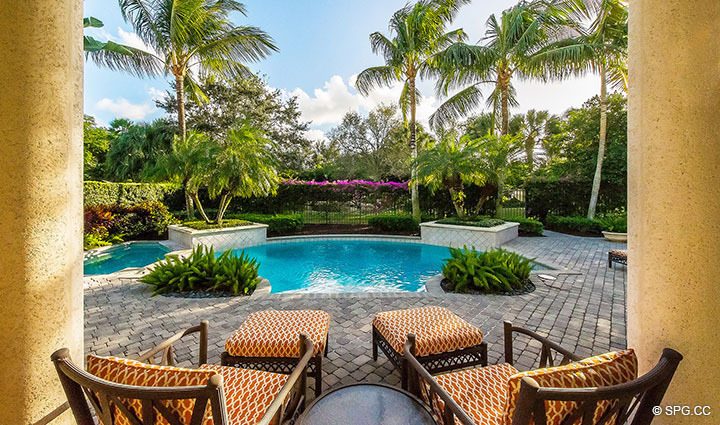 Relaxing Pool Area at Luxury Estate Home, 11204 Orange Hibiscus Lane, Palm Beach Gardens, Florida 33418.