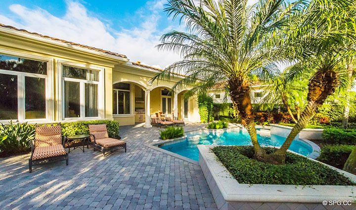 Expansive Pool Area with Grill at Luxury Estate Home, 11204 Orange Hibiscus Lane, Palm Beach Gardens, Florida 33418.